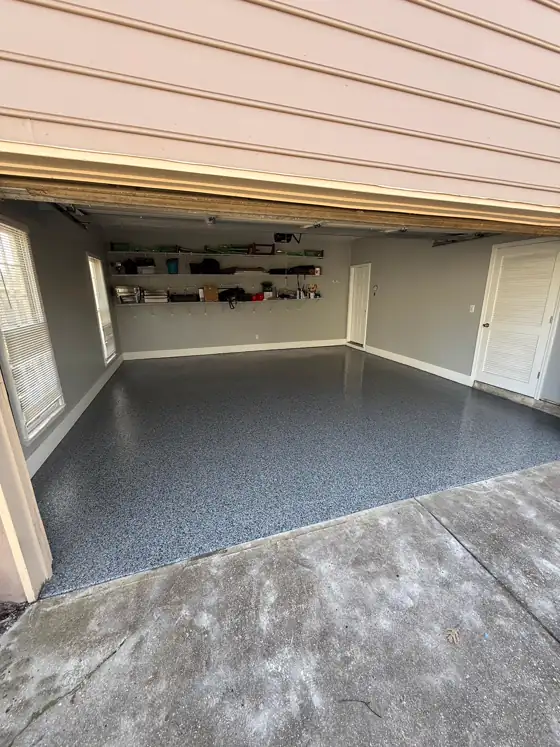 Blue-grey flake garage floor seen from the driveway