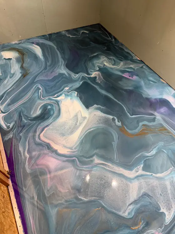 Teal and lilac iridescent metallic across a full floor