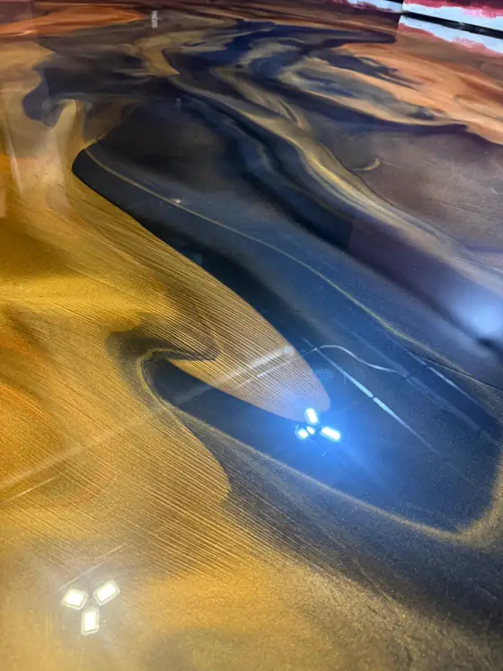 Gold and navy metallic floor with a mirror finish