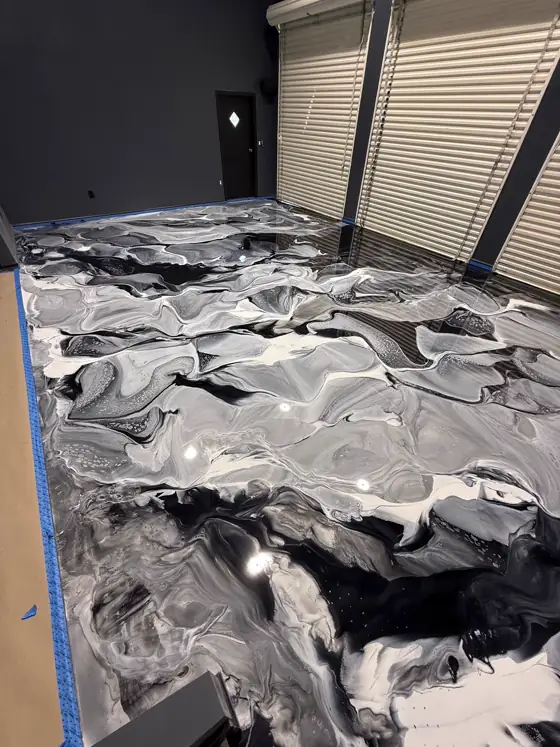 Black and white marbled metallic floor, wide view