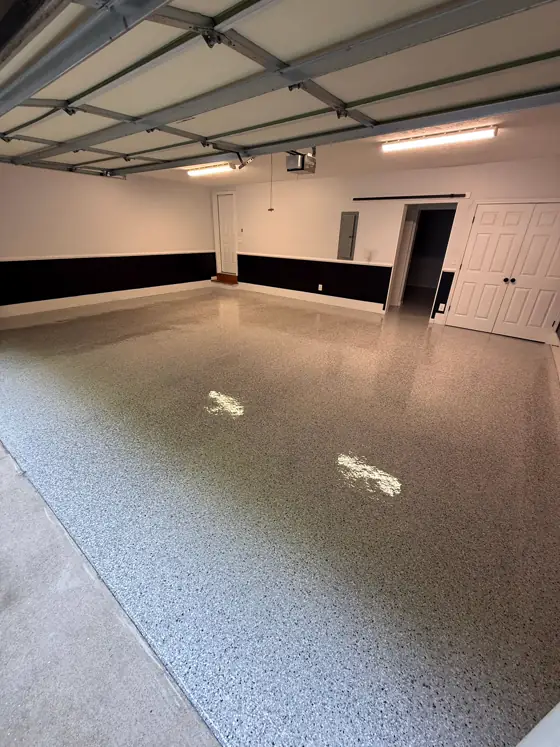 Polished grey floor running the length of a commercial space
